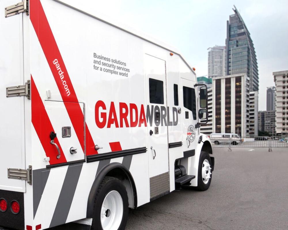 Money transport vehicle to a financial institution