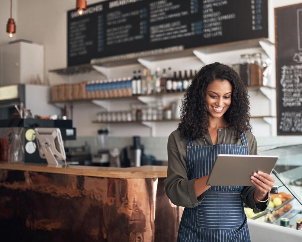store manager managing cash with intelligence
